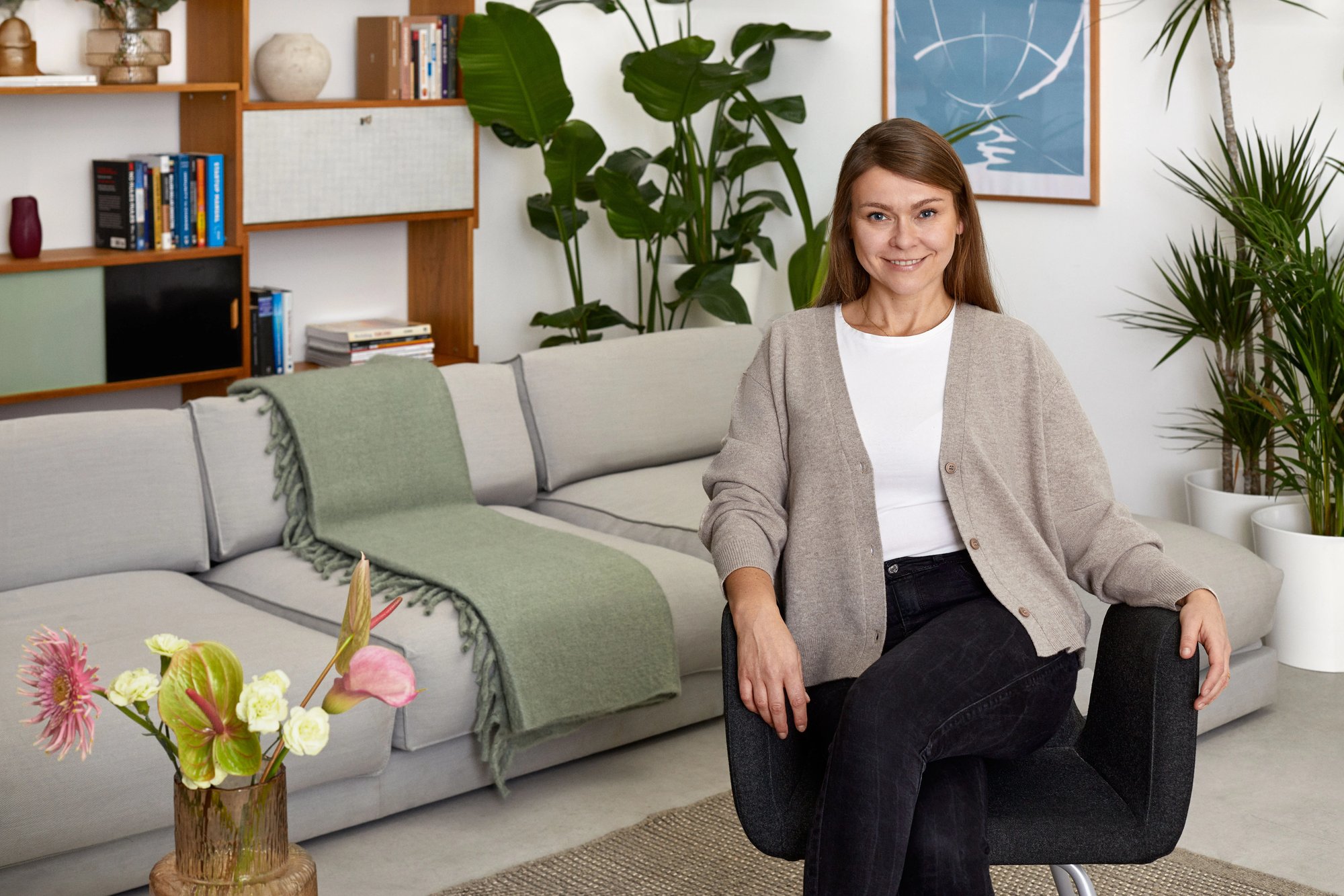 Smiling woman sitting on a chair